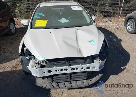 2015 Ford Focus Titanium z USA, uszkodzony, nr VIN 1FADP3J23FL383637